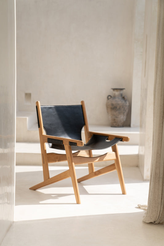 Poltrona Leo in teak e pelle