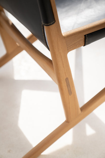 Poltrona Leo in teak e pelle